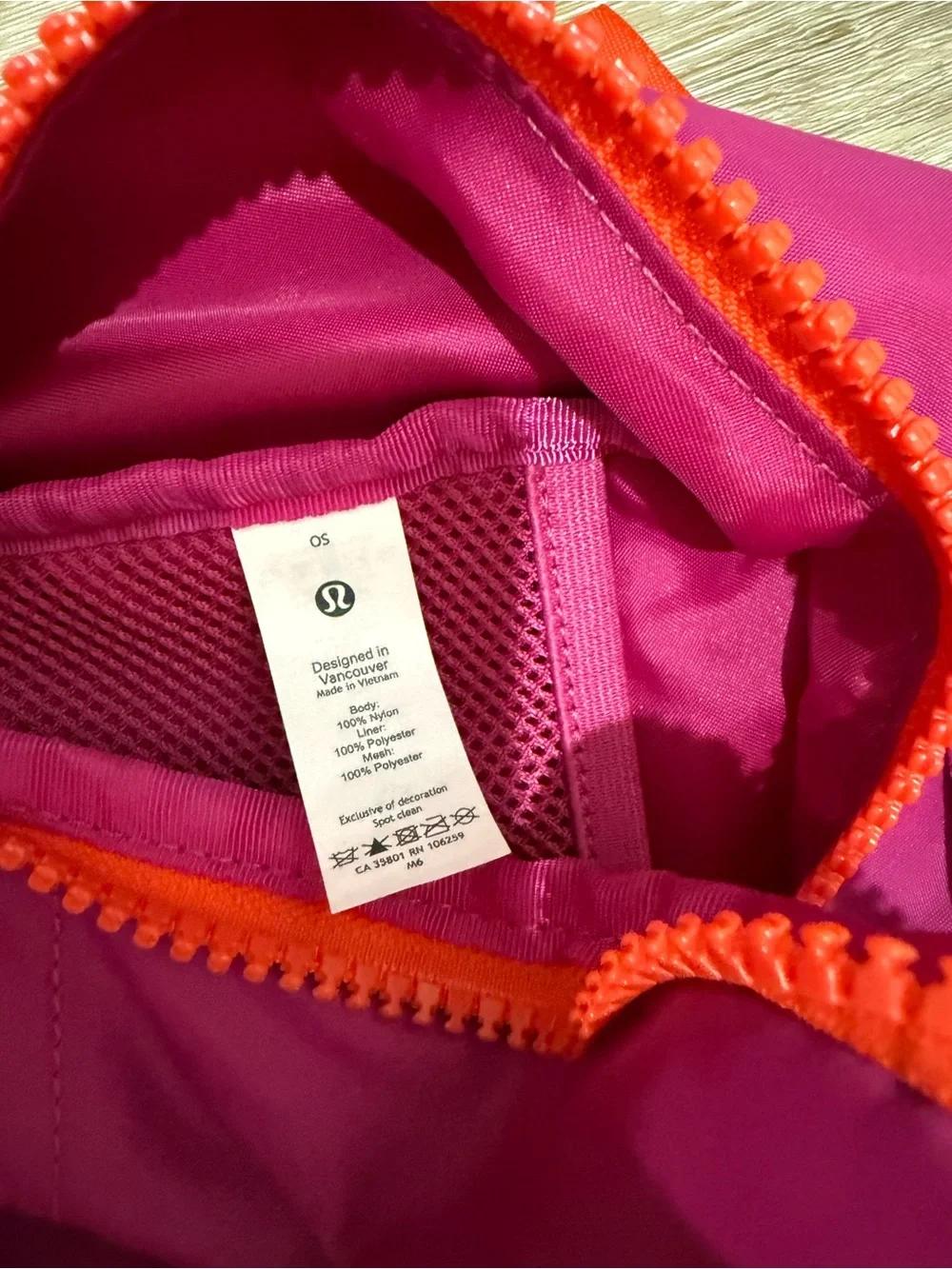 lululemon athletica Bright Magenta Backpack with Orange Trim